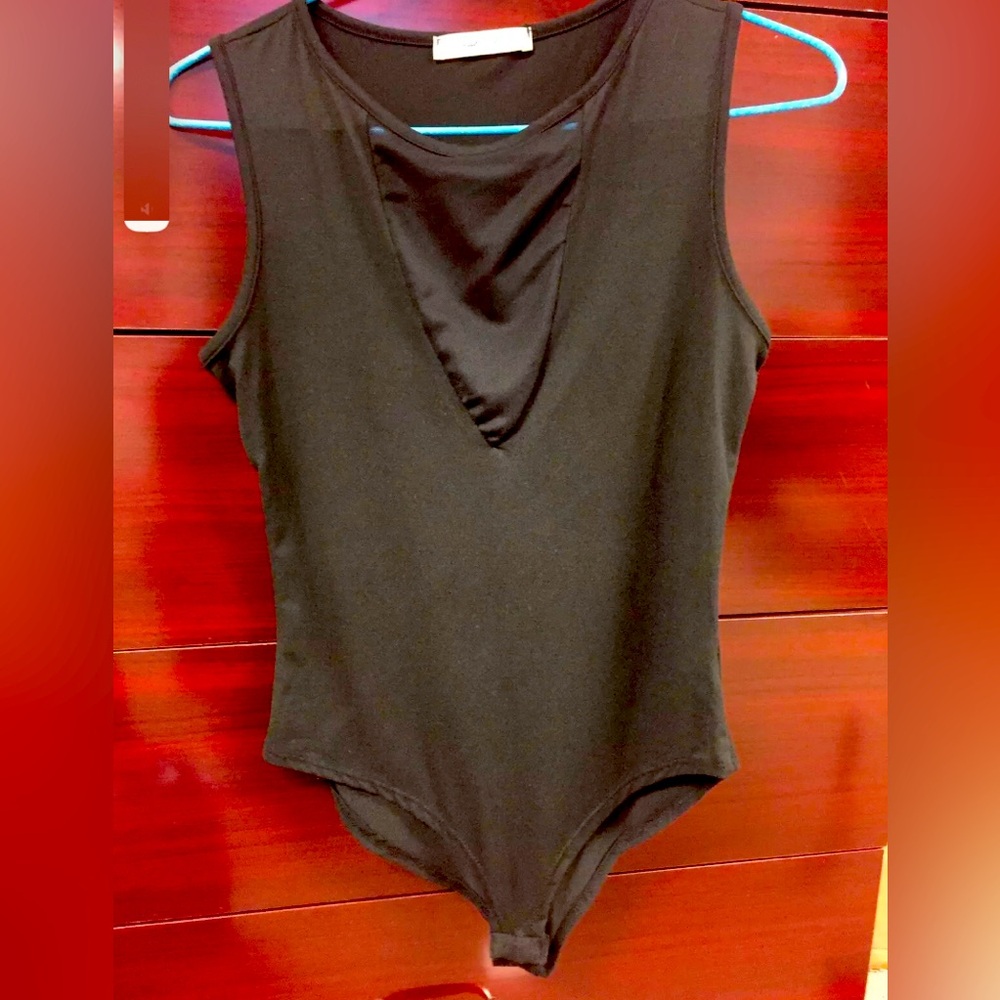 women's tight body top. Mesh neckline